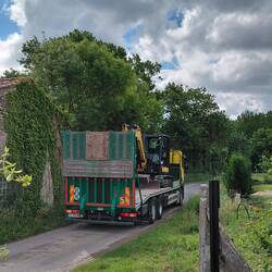 The big yellow digger arrives
