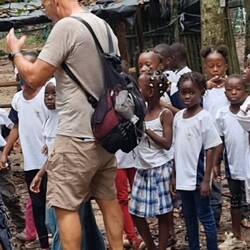 There was a school outing in the forest. The kids practised their English on us.