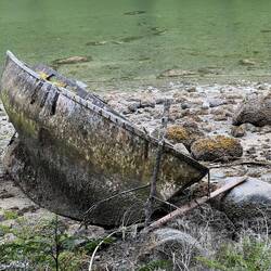 Old boat hull on the beach at Echo Bay