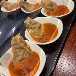 Pintxos. I think this is cod of some sort. They aren't usually labeled.