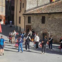 A group of locals drumming through the old town