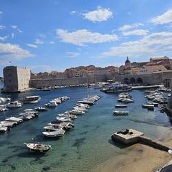 Harbour by a city gate.