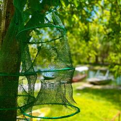 Une grosse activité de pêche artisanale dans la rivière pour alimenter les restaurants du village