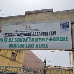 I'll have to translate this sign. Its related to the founder of the Dakar Rally.