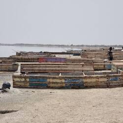 Salt boats at Lake Retba. They are used to bring harvested salt ashore.