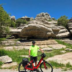 Tom with a mountain goat WAY up in the background 😉.