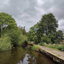 Looking ahead to Lock 19 with restored mill buildings on the right