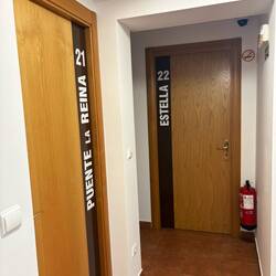 The hostel has rooms named after stages on the Camino.