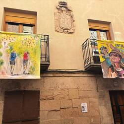 Along the route through town several balconies have beautiful Camino art hanging.