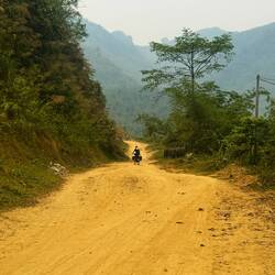 Sand road in the heat of midday