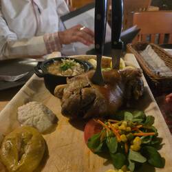 Pork knuckle and fried cabbage.