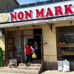 Abdu buying bread for us