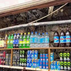 Mountain stream-chilled drinks on the side of the road