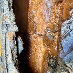 Texture of the rock behind the waterfall