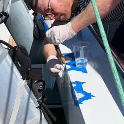 And then they are set to work! Patrick applies acid to remove the oxide.