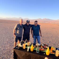 Tincho on left (our main guide) Cristóbal, and our driver Edwin provided sunset snacks and drinks