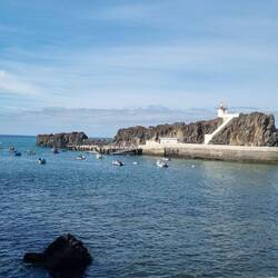 Câmara de Lobos. The rock wall is mostly natural.