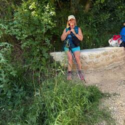 Finally a bit of shade and a cool stone wall.