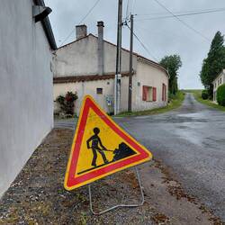 Rain is falling but the signs are out anyway