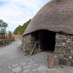 Roundhouse with stone base