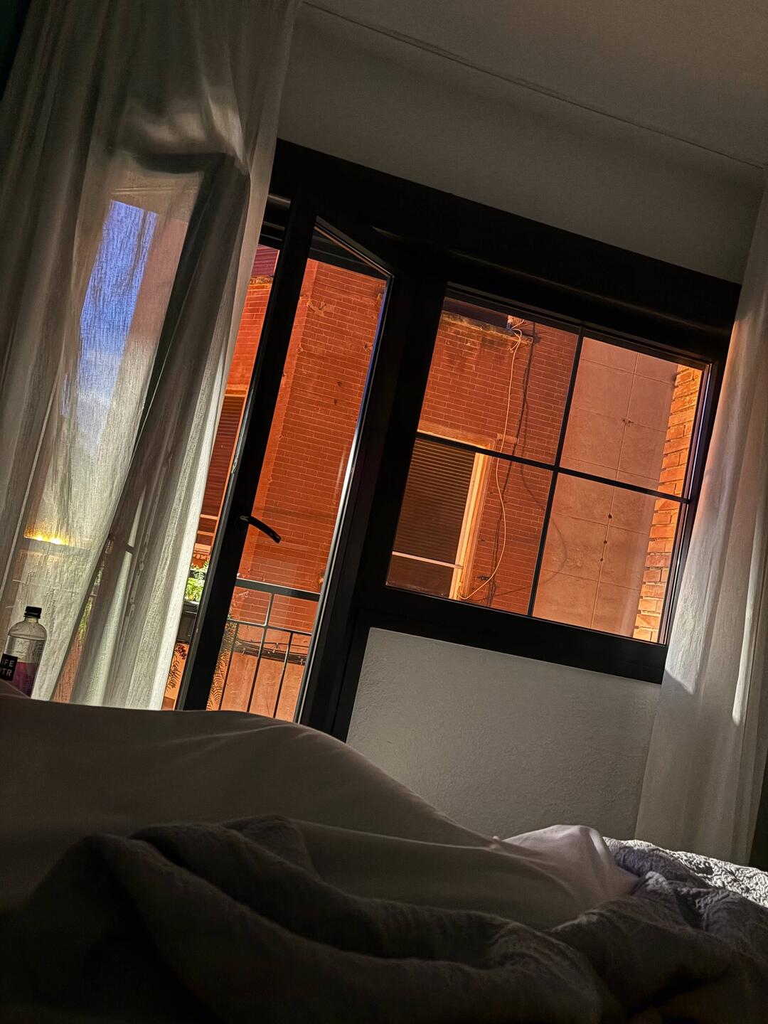 That's a little sunrise and a lot of the giant streetlight attached just outside our balcony.