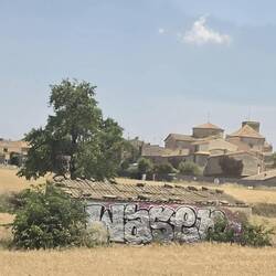 Small old stone buildings like this are found in hay fields all along the drive