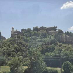 Several small towns along the drive are clustered onto hilltops like this one