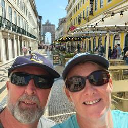 Arch in background commemorating rebuilding of lisbon