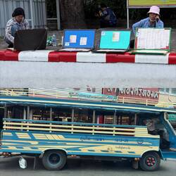 Lottery tickets are sold out of briefcases on the street and are everywhere even at a shrine