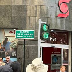 Love the sign, "Mr. Pedestrian for your safety wait for the green light"