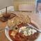 Shakshuka with iced coffee at Our Place.