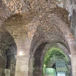 Entering under the palace