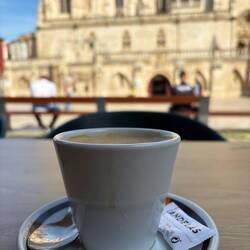 Coffee by the Carhedral while waiting for Mass.