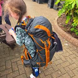 Elsie was offering to carry grandad's bag