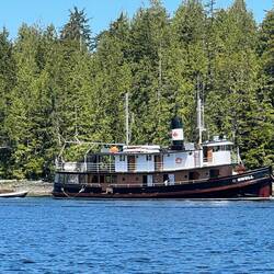 Heck of a private yacht...Just googled it: Old canadian fishing tug "Swell"