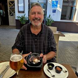 Tom wasn't very hungry and ordered the scallops. He received one 😄.