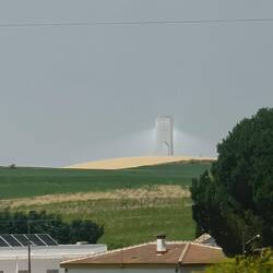 A solar farm generator in the distance