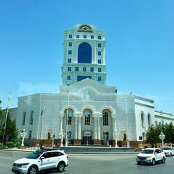White buildings, white cars