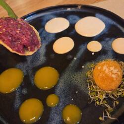 Beef Tatare with deep fried egg and a soft middle. Amazing how this is achieved.