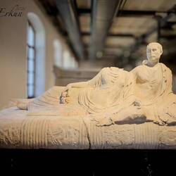 Marble lid of a sarcophagus from c. 220 CE ... depicting a reclining couple.