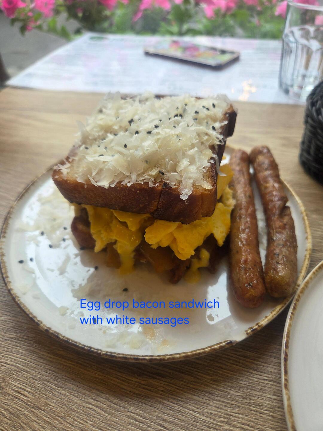 Egg drop sandwich with white sausages