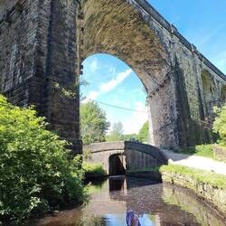 The impressive Saddleworth Viaduct with Bridge 75 and Lock 23 West beyond
