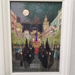 Poster in the orange shopSemana Santa (Holy Week) procession, a major Catholic tradition in Spain wh