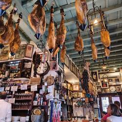 Leg hams curing in taberna