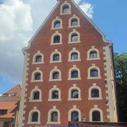 Windows depicts sacks, as this was a flour storage building.