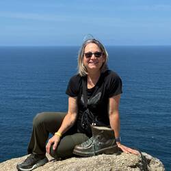 At the Finisterre boot sculpture — my walking days are done, and my feet are happy. 🥾😊