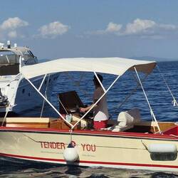 This boat was the "refreshments boat " selling all sorts of drinks, like G&Ts beer, wine and gelato