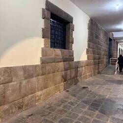 Building built utilizing the original Inca stone base