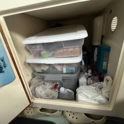 Storage and battery charger under aft passenger seat.