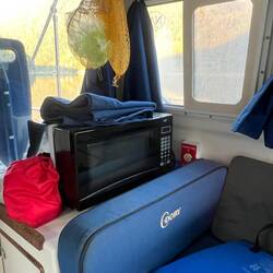Microwave. Emergency paddle outside back window.
